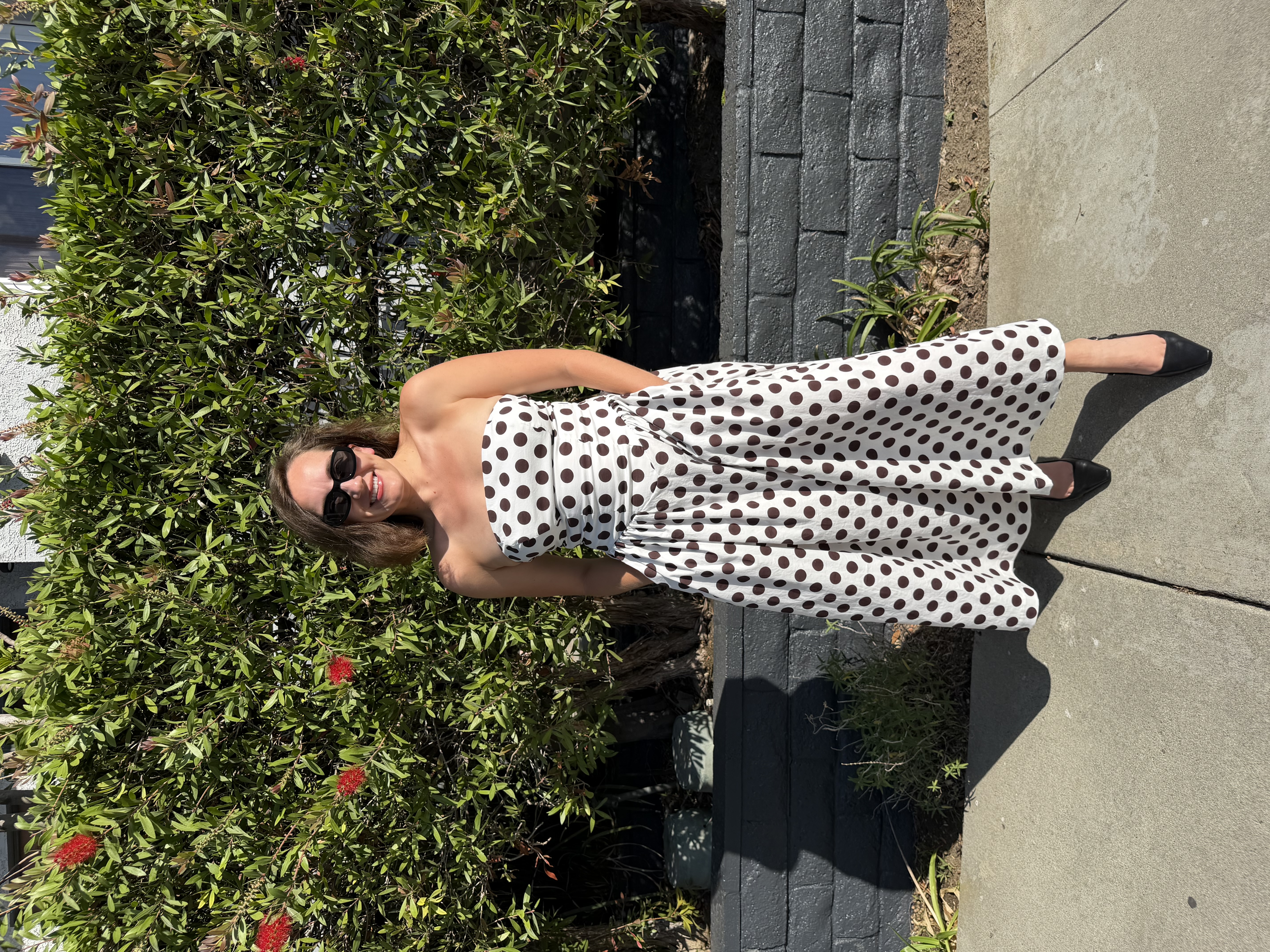 Emily wearing the finished Gemma Corset Dress in white and brown polka dot cotton